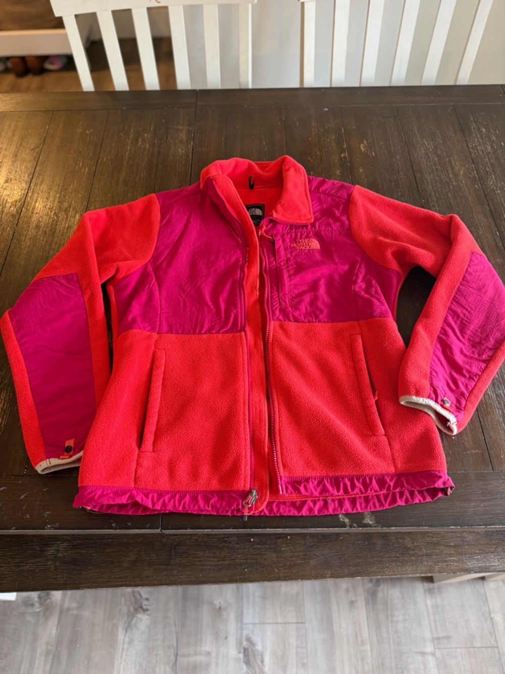 The North Face woman’s Pink and Red Colorblock Fleece Jacket